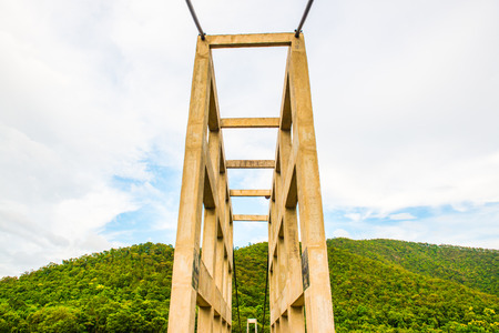 Suspension bridge at Mae Kuang Udom Thara dam, Thailand.の写真素材