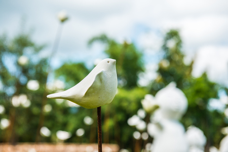 Bird sculpture in park, Thailand.の写真素材