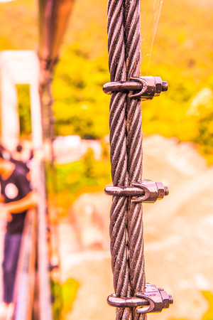 Sling of suspension bridge at Mae Kuang Udom Thara dam, Thailand.の写真素材