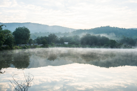Lake with mountain in winter, Thailand.の写真素材