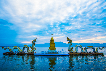 White Naga statue at Kwan Phayao, Thailand.の写真素材