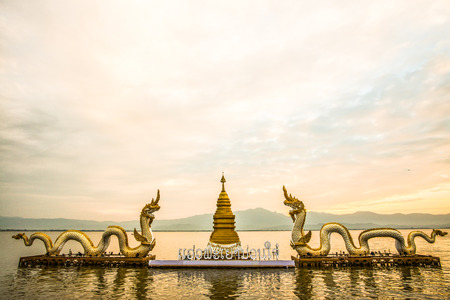 White Naga statue at Kwan Phayao, Thailand.の写真素材