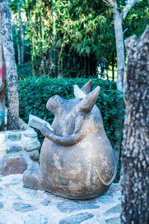 Buffalo statue in park, Thailand.の写真素材