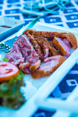 Duck on white plate, Thailand.の写真素材