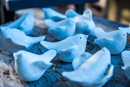Bird molding art on wooden panel, Thailand.の写真素材