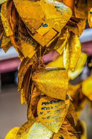 Golden leaf for donation, Thailand.のeditorial素材