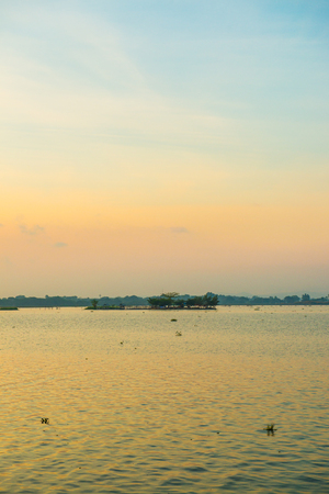 Lake view with Tilok Aram temple in Kwan Phayao lake, Thailand.の写真素材