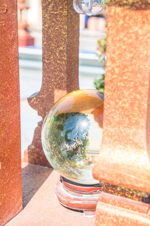 Glass ball in temple, Thailand.の写真素材