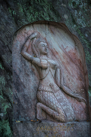 Carving art on rock in Huai Pha Kiang temple, Thailand.のeditorial素材