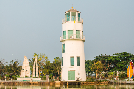 Lighthouse beside the lake, Thailand.の写真素材