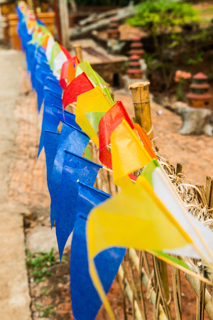 Small flag for buddhism festival, Thailand.の写真素材