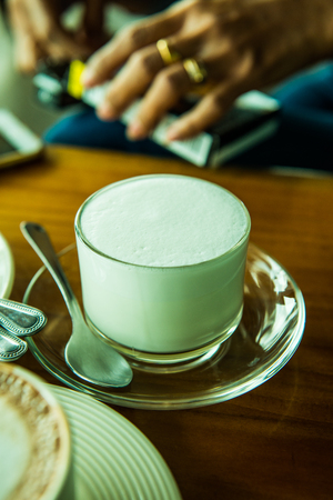 Hot milk in a cup, Thailand.の写真素材