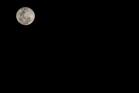 Super moon with dark background, Thailand.の写真素材