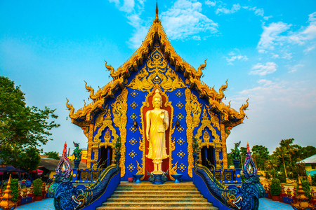 Standing buddha in Rong Suea Ten temple, Thailand.の写真素材