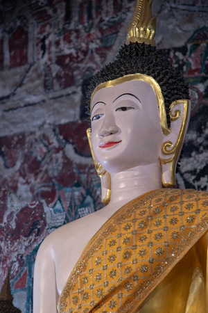 Beautiful Buddha with ancient wall painting in Rong Ngae temple, Thailand.の写真素材