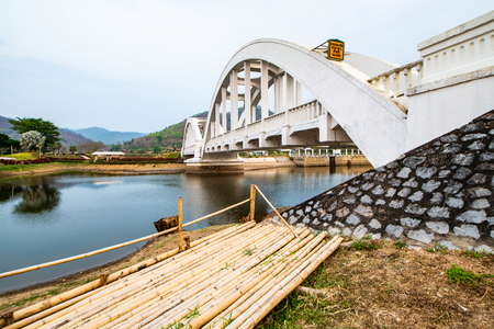 Thachompoo bridge or white bridge with weir in Lamphun province, Thailand.の写真素材