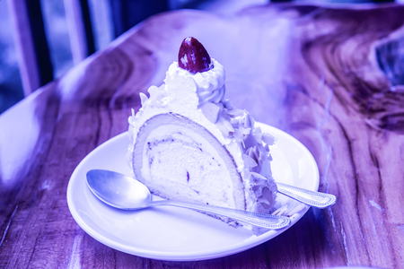 Almond ice cream cake on white plate, Thailand.の写真素材