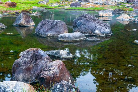 Hot water flowing in Chae Son hot spring, Thailand.の写真素材
