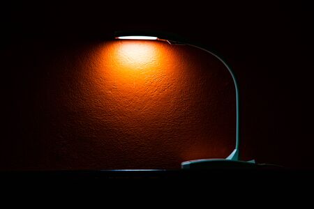 The lamp with orange wall, Thailand.
