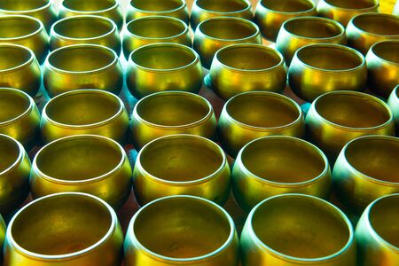 Group of alms bowls for donation, Thailand.の写真素材