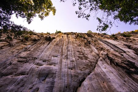 Cliff in tourist attraction of Phratupha rock painting, Lampang province.の写真素材