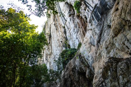 Cliff in tourist attraction of Phratupha rock painting, Lampang province.の写真素材