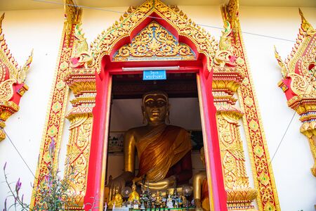 Ancient Buddha statue in Phra That Hariphunchai temple, Lamphun province.の写真素材