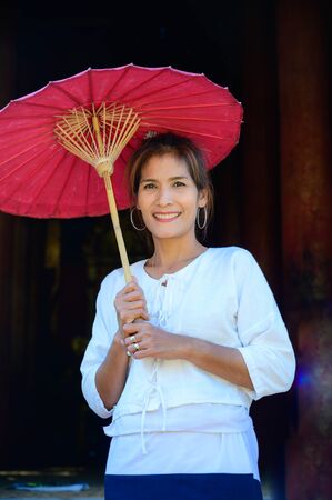Thai woman with Lanna style background, Chiang Mai.の写真素材