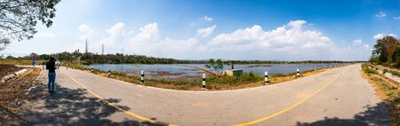 Panorama View of Mae Moh Reservoir with Bicycle Lane in Lampang Province, Thailand.の写真素材
