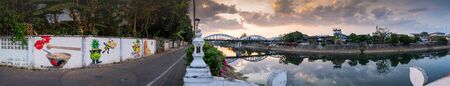 Panorama View of Ratsadaphisek Bridge over Wang River at Evening, Lampang province.の写真素材