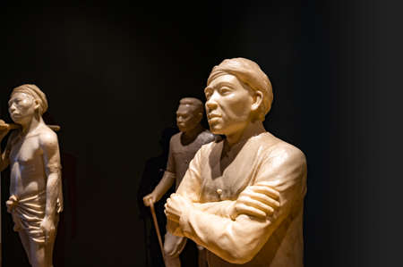 LAMPANG, THAILAND - March 8, 2020 : Fiberglass statue of Myanmar-Tai Yai people in Museum Lampang, Thailand.のeditorial素材