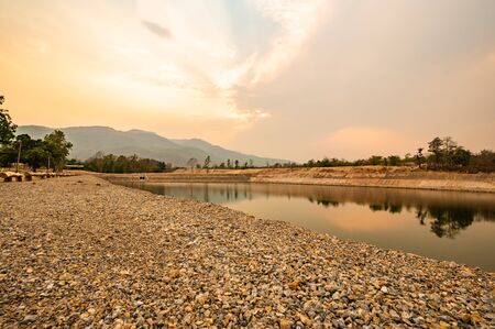Reservoir with mountain view in Chiang Mai province, Thailand.