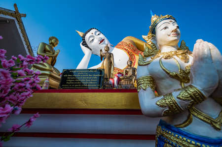 CHIANG MAI, THAILAND - March 18, 2020 : Reclining Buddha statue of Phra That Doi Kham temple, Chiang Mai province.のeditorial素材