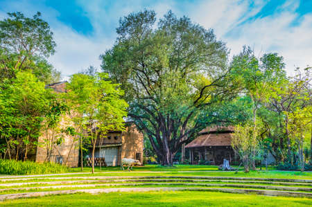 CHIANG MAI, THAILAND - March 20, 2020 : Tobacco curing building with beautiful park in Chiang Mai province, Thailand.のeditorial素材