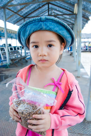 Asian little girl is traveling, Thailand.の写真素材