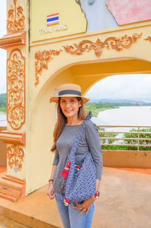 Asia Woman traveler at Golden Triangle, Chiang Rai province.の写真素材