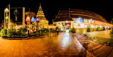 LAMPHUN, THAILAND - October 28, 2020 : Phra That Hariphunchai Pagoda with Lanna Style Lantern at Night, Lamphun Province.のeditorial素材