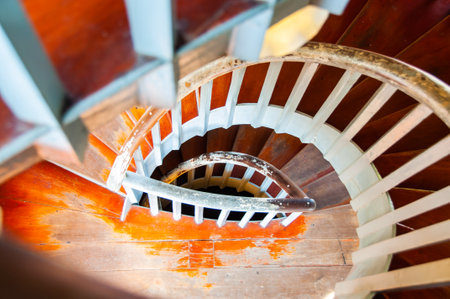 Spiral Wooden Stair in Old Building, Phra Nakhon Si Ayutthaya Province.のeditorial素材