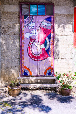 NAN, THAILAND - November 5, 2020 : Drawing Art on The Door at Nan Riverside Art Gallery, Thailand.のeditorial素材