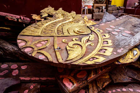 Ancient Wood Carving in Thai Temple, Chiang Mai Province.