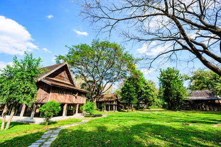 Lanna Traditional Houses with Grass Yard in Chiang Mai Province, Thailand.のeditorial素材