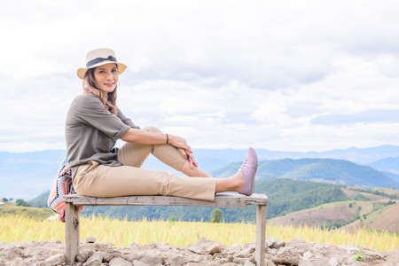 Asian Woman with Rice Field Background at Pa Bong Piang Rice Terraces, Chiangmai Province.の写真素材