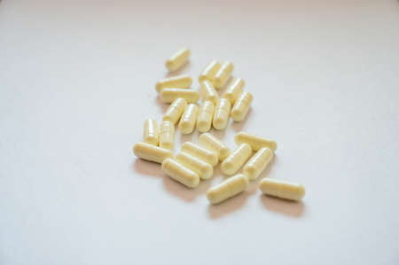 Medical White Capsules on White Background, Thailand.の写真素材