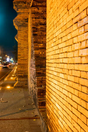 CHIANG MAI, THAILAND - March 19, 2022 : Tha Phae Gate at night, Chiang Mai province.