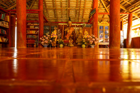 CHIANG MAI, THAILAND - March 19, 2022 : Wooden Buddha Statue in Old Pavilion at Wat Luang Khun Win, Chiangmai Province.のeditorial素材