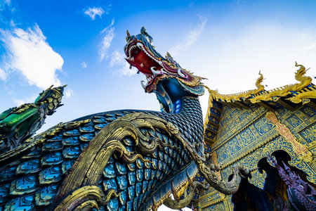 CHIANG RAI, THAILAND - October 14, 2018 : The Blue Temple or Wat Rong Suea Ten is a beautiful temple with a lot of Thai art, Chiangrai Province.のeditorial素材