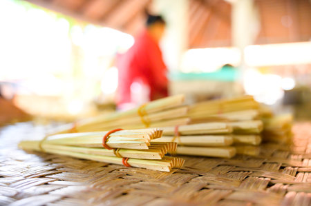 Bamboo is prepared for use in making Lanna style fans, Chiang Mai Province.の写真素材