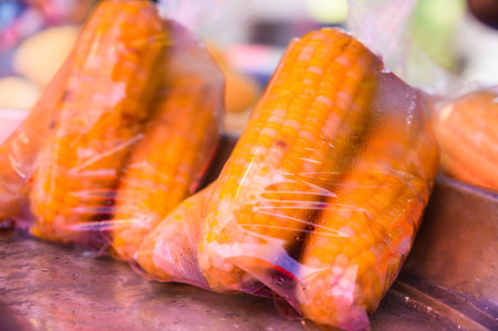 Boiled corn is a fruit that Thai people like to eat. And also commonly sold on stalls at flea markets, Thailand.の写真素材