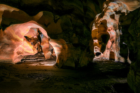 Mae Sap Cave or Rainbow Cave, this cave is formed from the arrangement of rock layers with beautiful patterns and colors in Chiang Mai Province, Thailand.の写真素材