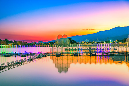 Chiang Mai Series : Light show and dancing fountains in the lake. Festive atmosphere and beautiful lights during Christmas celebration. Celebrations during the New Year Festival.の写真素材